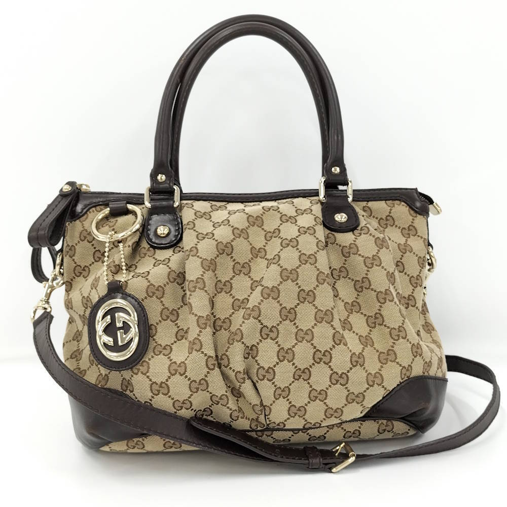 Gucci Sukey bag pleated monogram canvas logo charm Brown